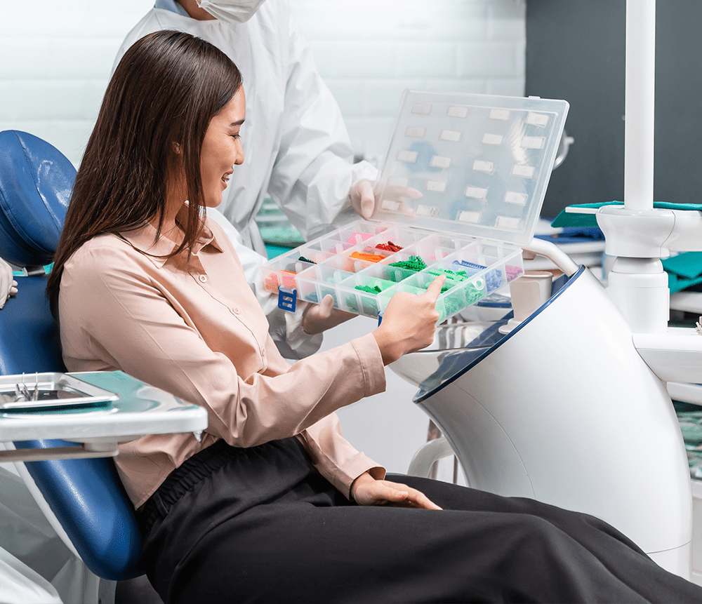 young patient smiling wearing braces
